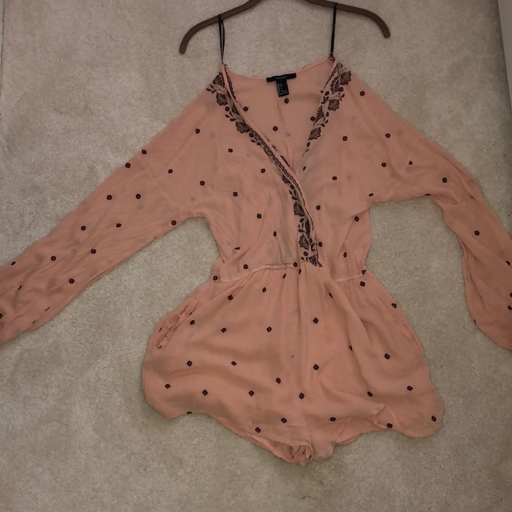 A beautiful light pink romper with maroon roses!